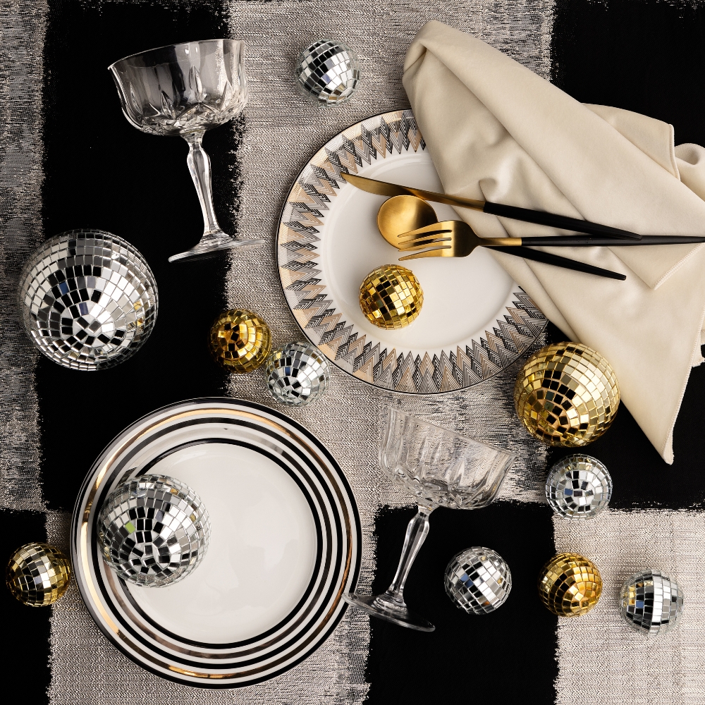 Helena Midnight linen and Velvet Pearl napkin on a party table
