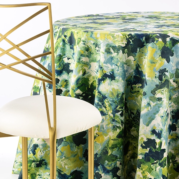 A chair next to the table with Bouquet Garden Tablecloth