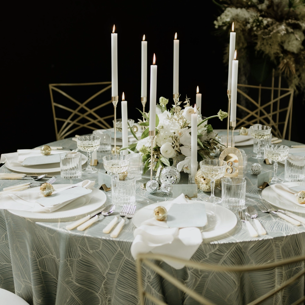 Nola White Dinner Napkins pair seamlessly with Palmers Slate Tablecloth.