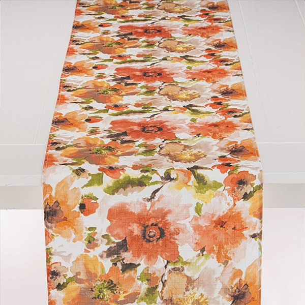 A Layla Floral table runner perfect for event linen rental