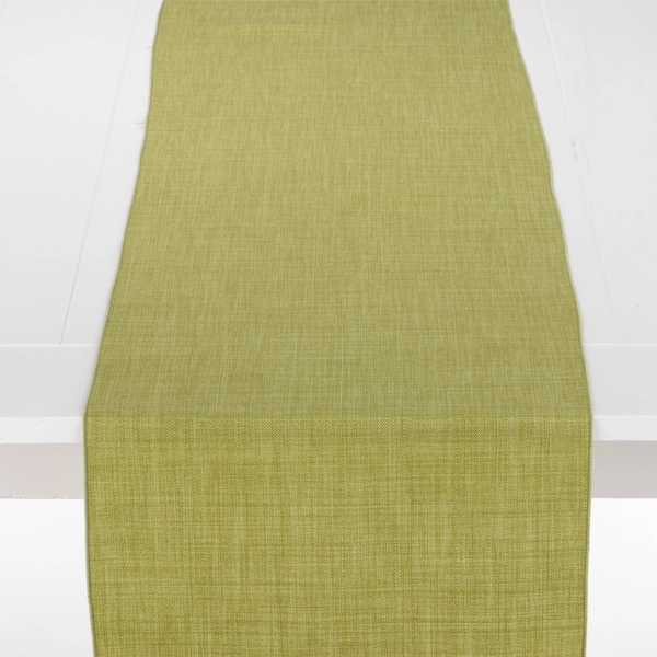 A Nola Spring Green table runner on a white table available for table linen rental.