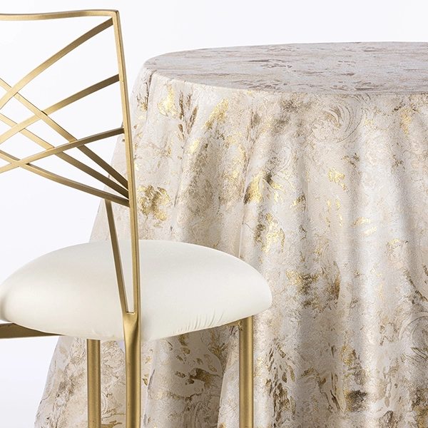 Radiance Gold Metallic Print Tablecloth brings glitz and glamour to your party.