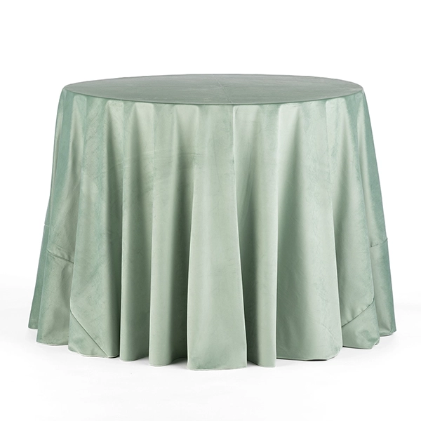 Velvet Peacock Jade Table Linen adds a touch of glamour to the table design without being too over-the-top.