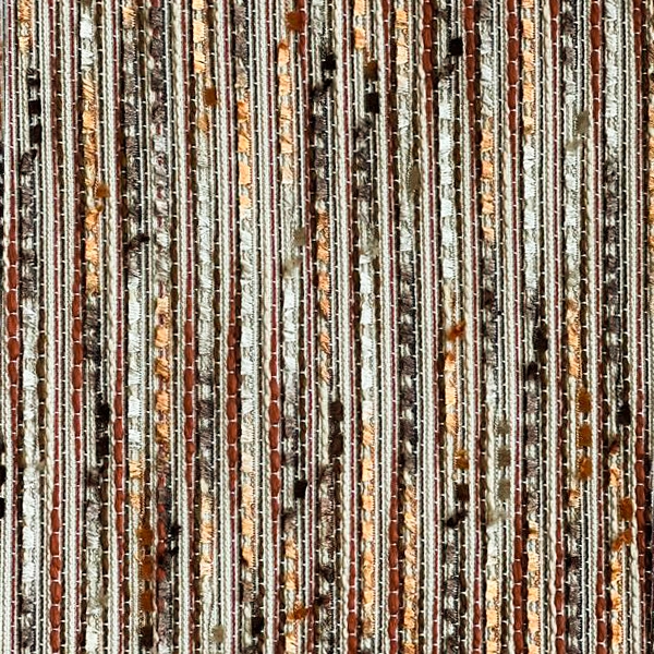 A close up of Canyon Rust fabric used for event linen rental.