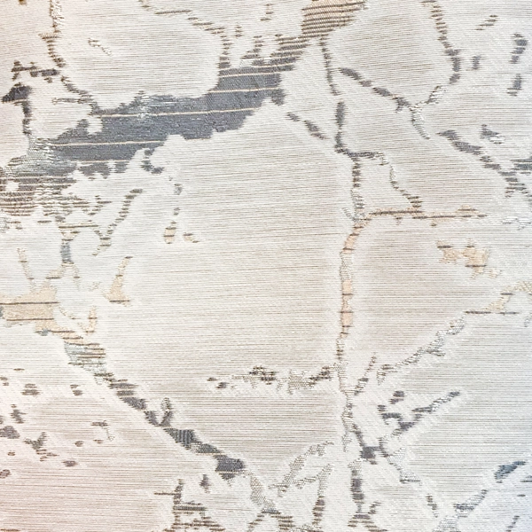 A close up of a Carrara Marble fabric rental.
