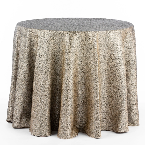 A round table covered in Electric Mist Midnight Oil cloth, available for event linen rental.