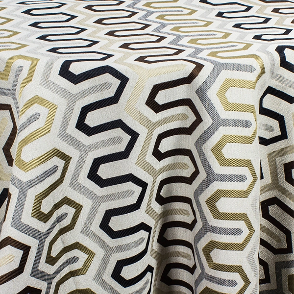 A close-up view of the Fiona Fand Antique black and gold Tablecloth Rental