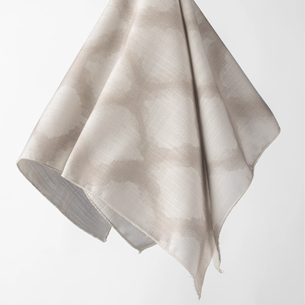 A white Lexington Linen Napkin with a pattern on it, perfect for event linen rental.