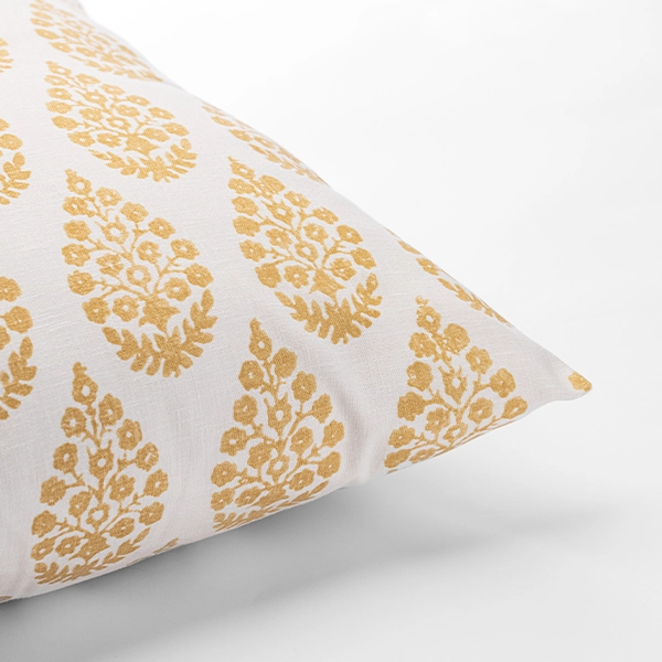A Maisie Sunshine Pillow for table linen rental.
