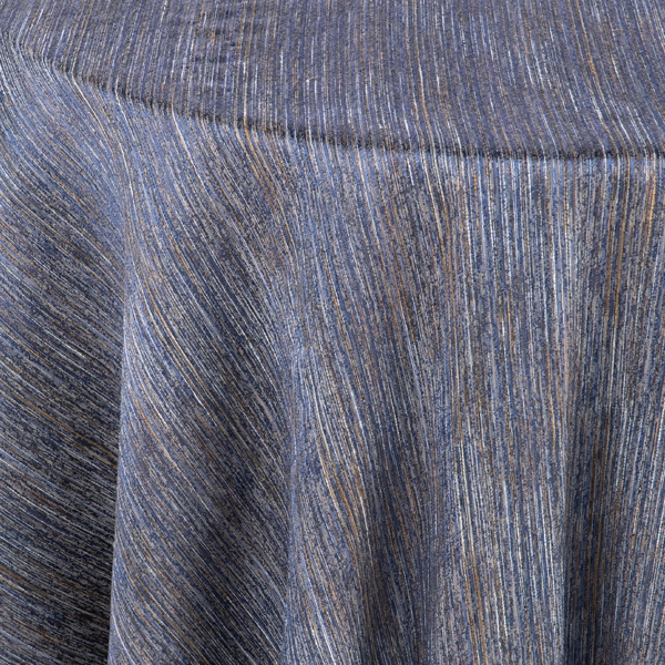 a close-up view of Millenial Blue cocktail tablecloth rental