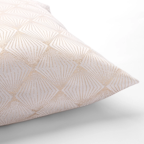 An elegant Stella Champagne Pillow with a stunning gold design.