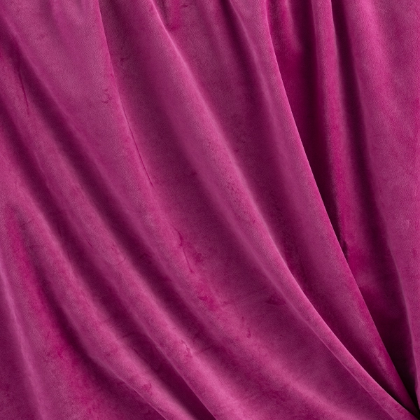 A Velvet Magenta curtain with folds, perfect for event linen rental.