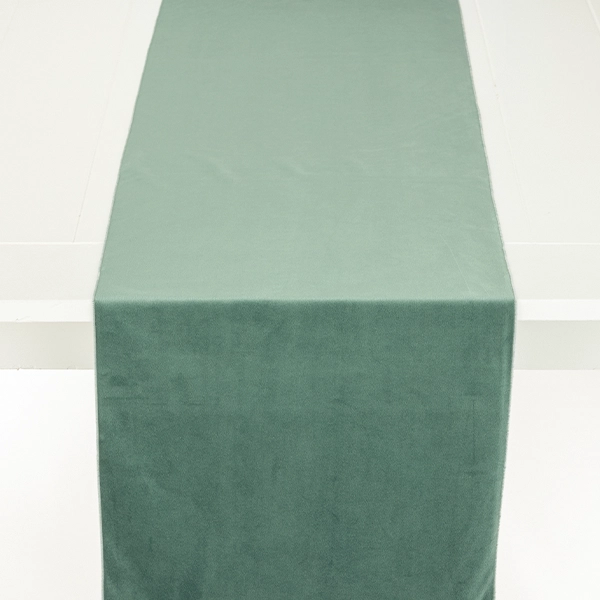 A long green Velvet Peacock Table Runner available for table linen rental.
