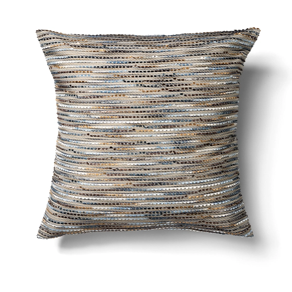 A Canyon Agate Pillow with a pattern available for table linen rental.