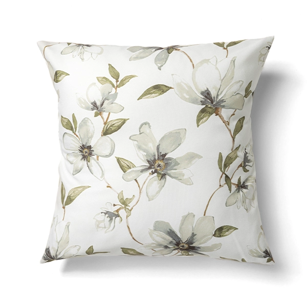 A Magnolia Fog pillow available for table linen rental.