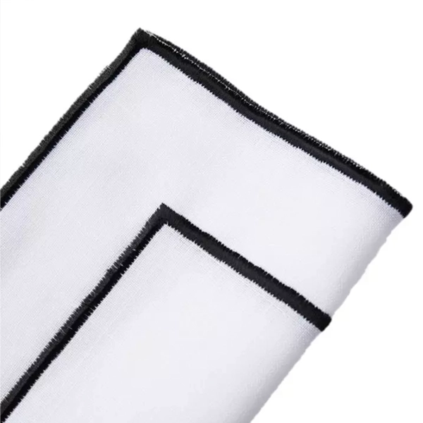 A white and black Lessing Black Stitch Napkin rental.