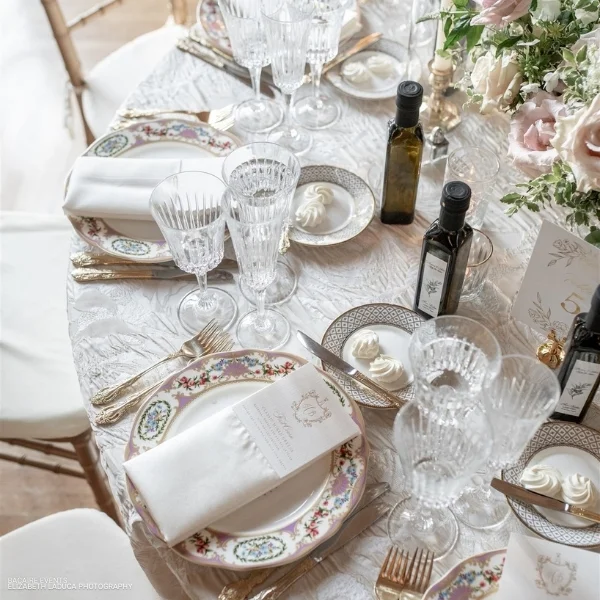 A Rosie Champagne linen rental set for a dinner party.