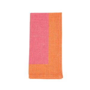 Monaco Woodrose towel in pink and orange, folded and isolated on a white background.