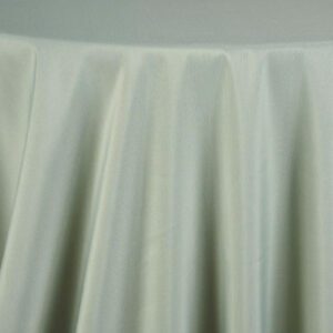 Monaco Woodrose fabric with even pleats hanging from a rod.