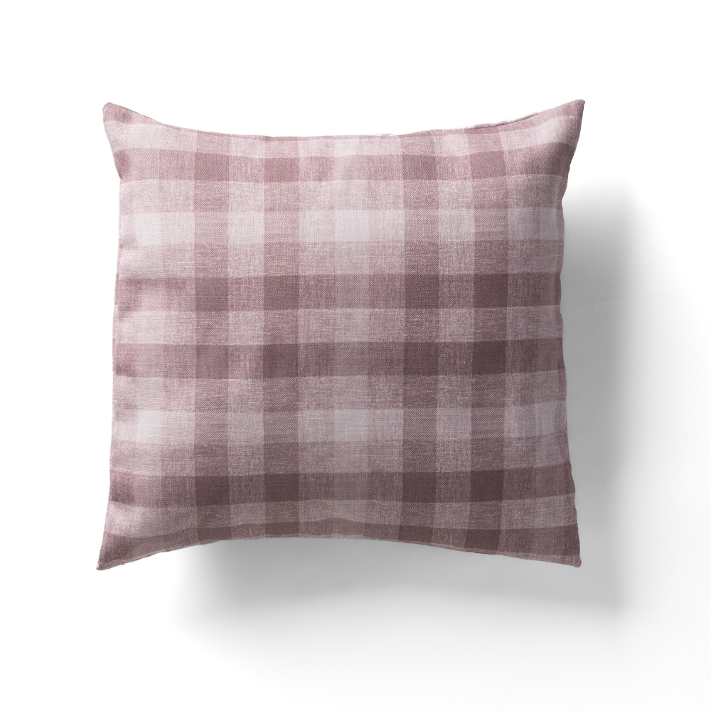 The Checkered Plaid Elderberry Pillow features a rectangular shape with a white background adorned with a light and dark purple checkered pattern.